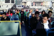 London group on bus Trafalgar Square