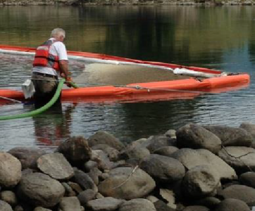 Booms removed from Kootenay and Lower Slocan Rivers; 18 locals hired after yesterday's job fair