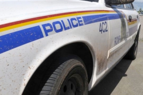 RCMP arrest man trying to cut down power pole; suspect's house later destroyed by fire