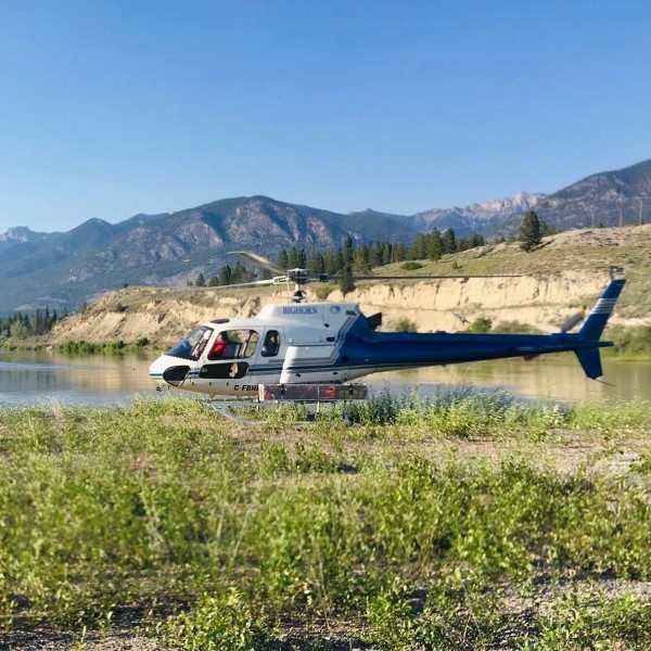 Mountie and paddle boarder extracted by helicopter after heroic river rescue