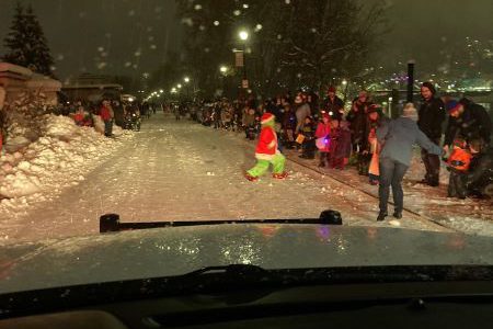 Grinch steals Christmas/show during Santa Parade